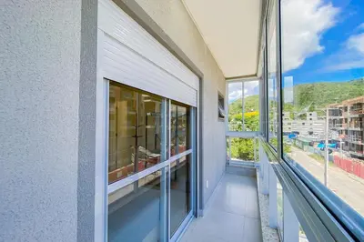 Uma varanda ou terraço em Praia de Palmas, 500m, Conforto e Praticidade, 0178