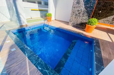 A piscina em ou perto de Apartamento 2 Quartos sendo 1 Suíte na Praia - 0317