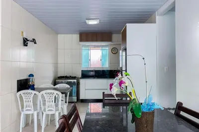 A cozinha ou kitchenette de Casa 400m da Praia de Palmas - 0343