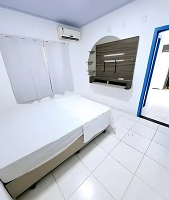 Uma cama ou camas num quarto em Apartamento econômico para até 4 Apto Econômico para 4 pessoas - Completopessoas, totalmente equipado