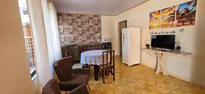 Uma televisão e/ou sistema de entretenimento em Casa Aconchegante a 600m da Praia no Bairro da Barra