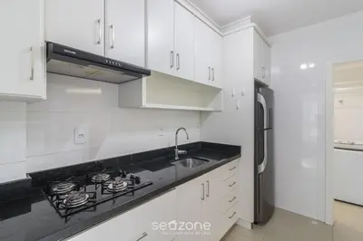 A cozinha ou kitchenette de Apto 3 Quartos a 130m da Praia MMP0137