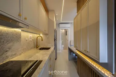 A cozinha ou kitchenette de Apt c/ Churrasq. 600m da Praia AQT0604