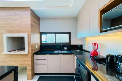 A cozinha ou kitchenette de Praia de Palmas - Vista Mar - Torre B - Novo - 0484