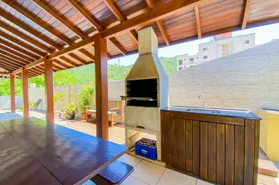 Uma televisão e/ou sistema de entretenimento em Casa com jacuzzi ideal para dias em família! 0453
