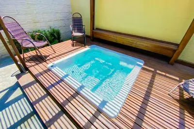 A piscina em ou perto de Casa com jacuzzi ideal para dias em família! 0453