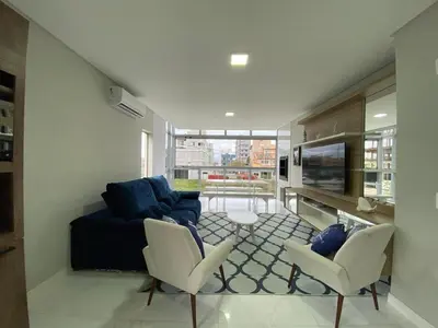 Uma televisão e/ou sistema de entretenimento em Apartamento em Bombinhas