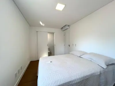 Uma cama ou camas num quarto em Res Diamante - Praia de Bombas