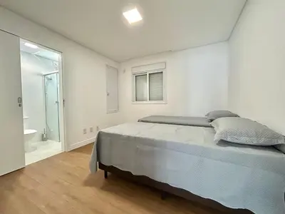 Uma cama ou camas num quarto em Res Diamante - Praia de Bombas