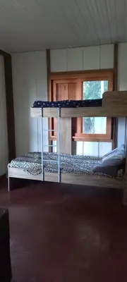 Uma cama ou camas num quarto em Casa do canto das ondas