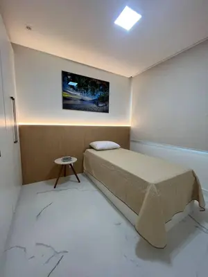 Uma cama ou camas num quarto em Ap Ilhas Maurício