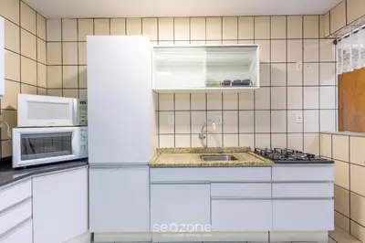 A cozinha ou kitchenette de Apto Beira-Mar c/ Vista p/ Praia VTE0301