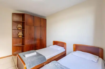 Uma cama ou camas num quarto em Apto Beira-Mar c/ Vista p/ Praia VTE0301