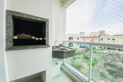 Uma varanda ou terraço em Praia de Palmas - Apto 500m da Praia, 2 Dorms - 0180