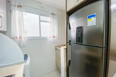 A cozinha ou kitchenette de Praia de Palmas - Aconchego a 500m do Mar 0181