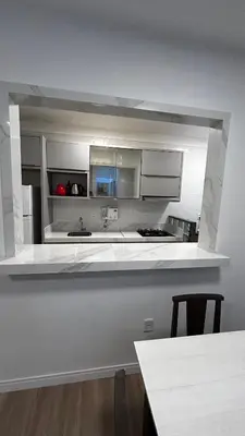 A cozinha ou kitchenette de Apartamento à 100 metros do mar - Meia Praia