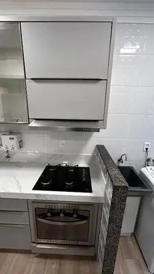 A cozinha ou kitchenette de Apartamento à 100 metros do mar - Meia Praia