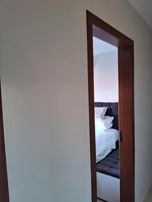 Uma cama ou camas num quarto em Quarto em Tijucas