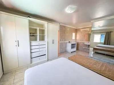 Uma cama ou camas num quarto em Casa Vila de Palmas - 0340