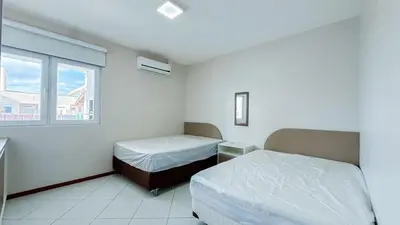 Uma cama ou camas num quarto em Cobertura com jacuzzi Aquecida exclusiva - 0432
