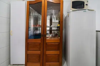 A cozinha ou kitchenette de Apto Flor da Manhã - 50 metros da praia de Bombas