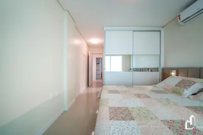 Uma cama ou camas num quarto em Cobertura 03 dormitórios na Avenida dos Coqueiros