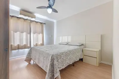 Uma cama ou camas num quarto em Casa Beija-Flor, Piscina exclusiva, Praia de Bombas, Bombinhas