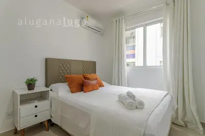 Uma cama ou camas num quarto em Apartamento TOP a 500m da praia