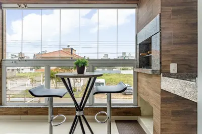 Uma televisão e/ou sistema de entretenimento em Apartamento TOP a 500m da praia