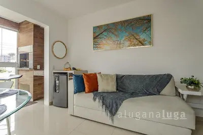 Uma área de estar em Apartamento TOP a 500m da praia