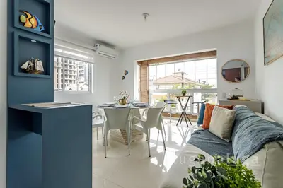 Uma área de estar em Apartamento TOP a 500m da praia