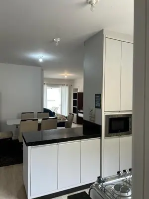 A cozinha ou kitchenette de Apartamento proximo ao mar