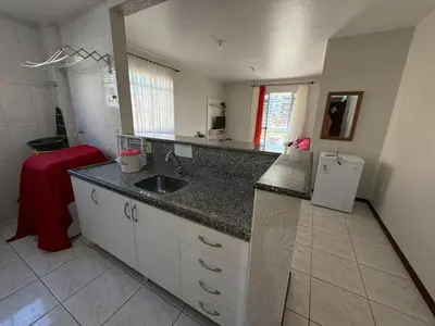 A cozinha ou kitchenette de Cód 107 - Apartamento a 50m do mar em Palmas