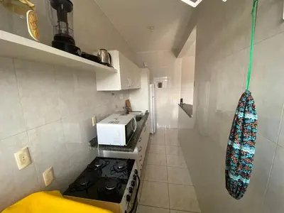 A cozinha ou kitchenette de Cód 118- Apartamento á 50m do mar