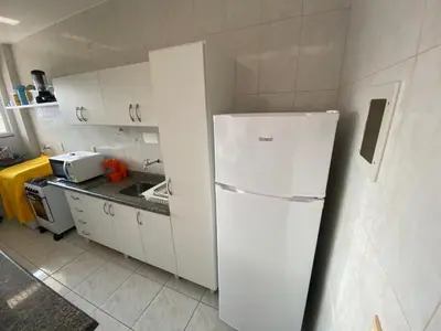 A cozinha ou kitchenette de Cód 118- Apartamento á 50m do mar