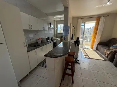 A cozinha ou kitchenette de Cód 104- Apartamento aconchegante de 3 dormitórios
