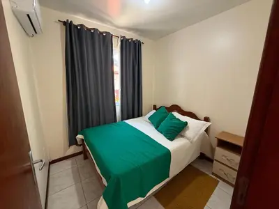 Uma cama ou camas num quarto em Cód 104- Apartamento aconchegante de 3 dormitórios