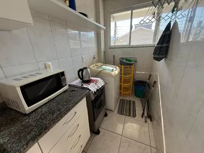A cozinha ou kitchenette de Cód 104- Apartamento aconchegante de 3 dormitórios