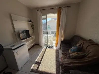 Uma televisão e/ou sistema de entretenimento em Cód 104- Apartamento aconchegante de 3 dormitórios