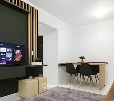 Uma televisão e/ou sistema de entretenimento em Apartamento 8º andar com Garagem e Churrasqueira