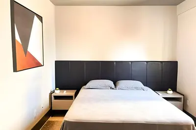 Uma cama ou camas num quarto em ASA | Apto de Alto Padrão | Ed à Beira Mar |Design
