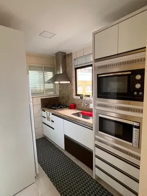 A cozinha ou kitchenette de Apartamento de Praia em Itapema
