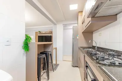 A cozinha ou kitchenette de Impecável Apto a 150 Metros Praia de Bombas