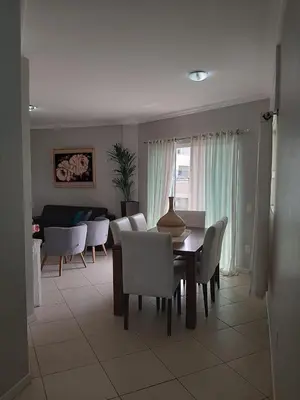 Uma área de estar em Apartamento 3 quartos em Bombinhas a apenas 100 metros da praia