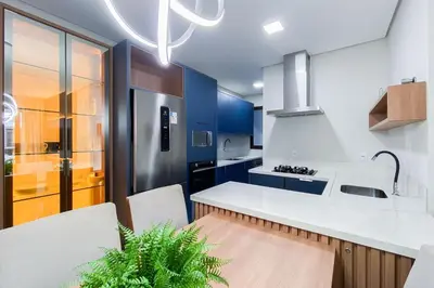 A cozinha ou kitchenette de Há 250 metros do mar, apto novo na praia de Palmas - 0141