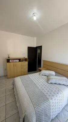 Uma cama ou camas num quarto em Residencial Vista Bela