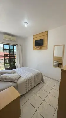 Uma cama ou camas num quarto em Residencial Vista Bela