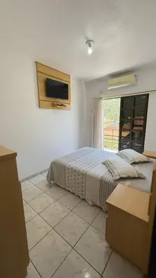 Uma cama ou camas num quarto em Residencial Vista Bela