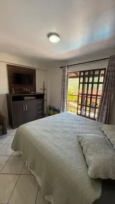 Uma cama ou camas num quarto em Residencial Vista Bela