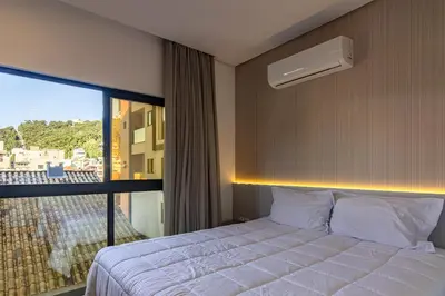 Uma cama ou camas num quarto em Flats Four Seasons by RD Stays